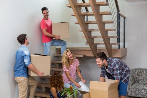 Removal van and packed moving boxes for a South Croydon house move