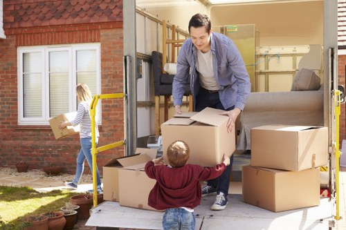 House movers loading furniture in a South Croydon residential street