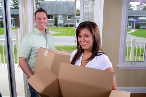Team loading household items for a local removal service in South Croydon