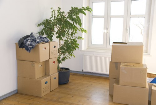 Packed office boxes and dismantled desks ready for South Croydon office move