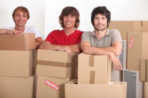 Team planning a move with packing and loading equipment