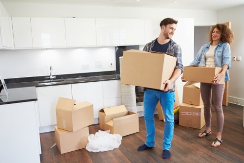 Professional packing and handling of office equipment during relocation
