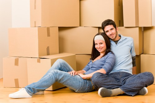 Careful wrapping of fragile household items during packing
