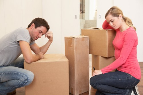 Packed moving boxes and household items ready for removal