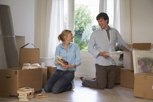 Loading household boxes and furniture into a moving van