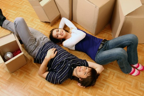 Unpacking and organising boxes in a new South Croydon property