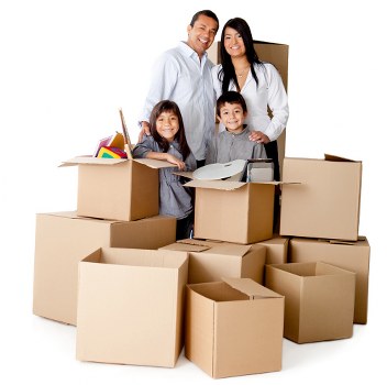 Professional movers carrying furniture through a South Croydon property